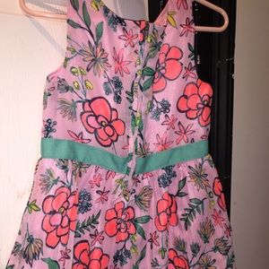 Little girls bright summer dress with flowers